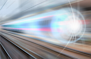 Fototapeta na wymiar High speed train runs on rail tracks - Train in motion