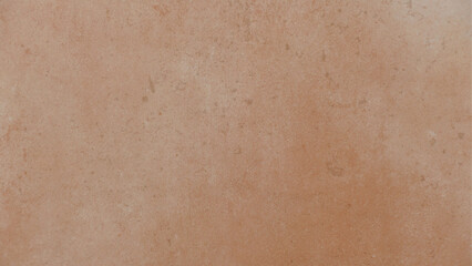 Textur einer leicht orangen Fliese
