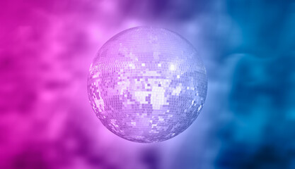 Party disco mirror ball reflecting colorful  lights 