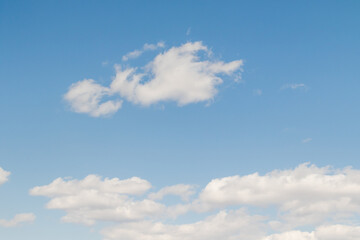 Naklejka na ściany i meble Blue Sunny sky, white Cumulus clouds lower layer of cloud cover, sky background .