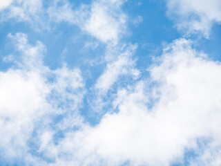 Fototapeta premium White clouds on a blue sky background.