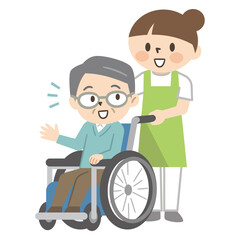 若い介護士と話す車椅子のシニア男性