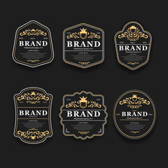 Luxury golden and black premium quality labels set isolated