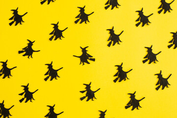 Creative orange pattern made of witches. Minimal flat lay.