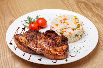 grilled steak with vegetables and rice