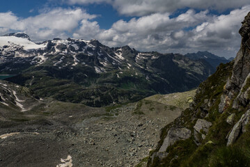 Great views to the peaks and glaciers of the Austrian Alps, Hohe Tauern park. Picturesque and beautiful scene, full of dark clouds, snow and peace in soul. Near city Enzingerboden, Austria, Europe.