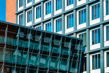 Modern office building. Framed windows wall of skyscraper in Hamburg Germany