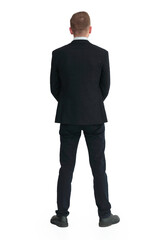 rear view. young man in a business suit looking at a white screen.