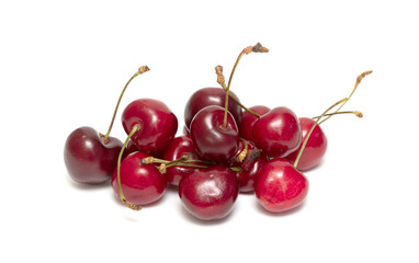 Naklejka na ściany i meble Ripe sweet cherry isolated on a white background, closeup.