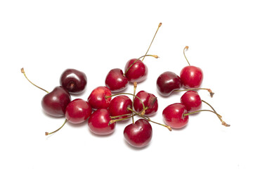 Obraz na płótnie Canvas Ripe sweet cherry isolated on a white background, closeup.