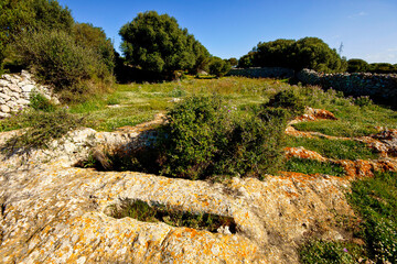 Santuario talayótico de Torretrencada, tumbas antropomorfas. Ciutadella.Menorca.Baleares.España. © Tolo