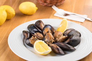 Turkish Delicious Rice Stuffed Mussels serving with lemon. Turkish Midye Dolma