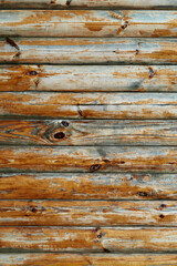Fototapeta premium old weathered wooden planks as a brown background, peeling paint and cracks