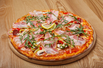 pizza with salami and arugula