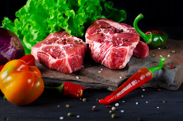 Meaty juicy marble steaks lie on wild stone