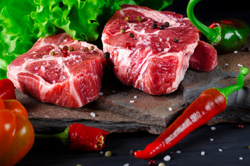 Food set for a picnic. Beef steaks ribeye ready to cook at barbecue