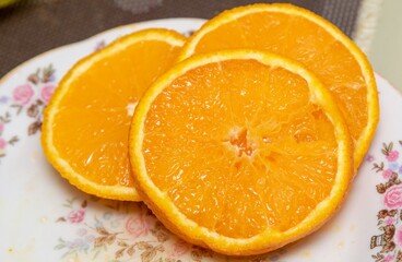 Fototapeta na wymiar Orange slices, dessert, closeup, background.