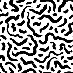 Fototapeta na wymiar Seamless pattern with swirled lines. Freehand brush strokes. Ink grunge vector texture. Black wavy lines on white background. Paint brushstrokes freehand drawing. Abstract wrapping paper