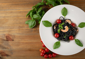 Black Spaghetti with Shrimps on White Restaurant Plate