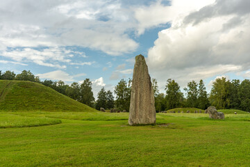 Tall rune stone at a burial ground in Sweden