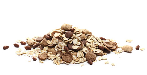 Chocolate muesli cereal pile isolated on white background