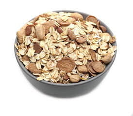 Chocolate muesli cereal pile in porcelain bowl isolated on white background