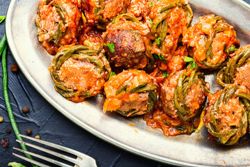 Meat cutlets and asparagus beans