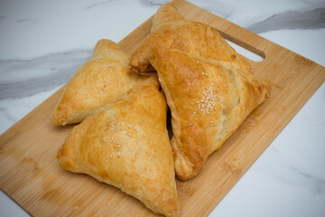 The samosa. Traditional Oriental dish with meat.
