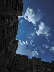 Building and clouds, blue sky