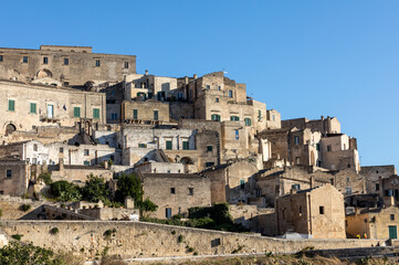Fototapeta na wymiar View of the Sassi di Matera a historic district in the city of Matera, well-known for their ancient cave dwellings. Basilicata. Italy