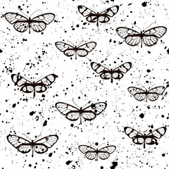 Butterflies seamless pattern with splashes of black ink. Isolated on white background.