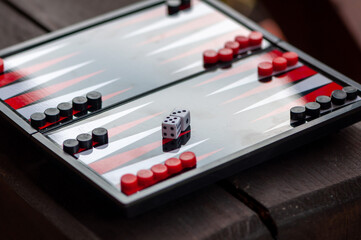 Close-up of a backgammon table. Focus on the dice.