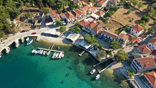 Aerial drone photo of picturesque small fishing village of Frikes a safe anchorage for sail boats and yachts in island of Ithaki or Ithaca, Ionian, Greece
