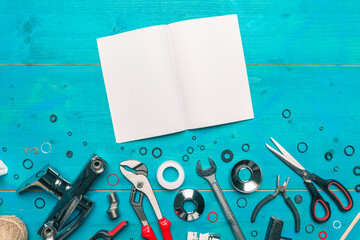 Plumbing tools and blank notebook mock up