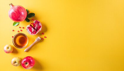 Rosh hashanah (Jewish New Year holiday), Concept of traditional or religion symbols on pastel yellow paper background.