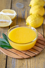 Glass bowl of lemon curd