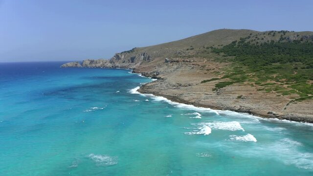 Aerial view, flight at cliff and beach with Hotel, Cala Agulla, Cala Mesquida, Mallorca, Balearic Islands, Spain
