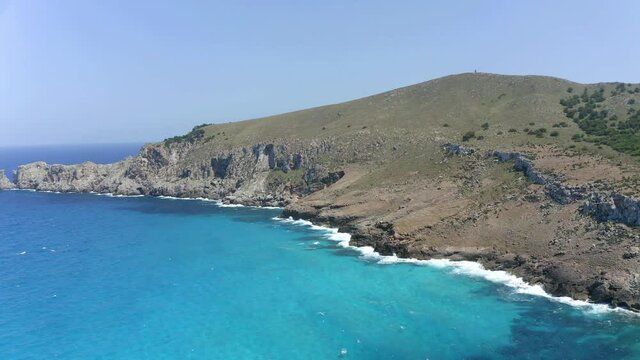 Aerial view, flight at cliff and beach with Hotel, Cala Agulla, Cala Mesquida, Mallorca, Balearic Islands, Spain