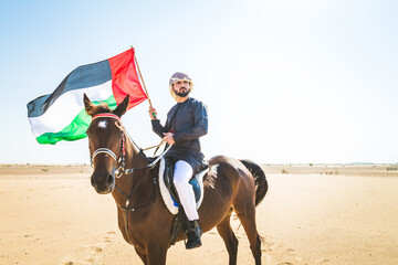 Arabian man with horse in the desert