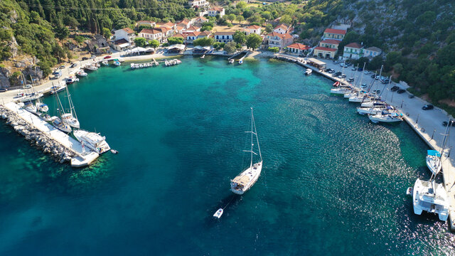 Aerial drone photo of picturesque small fishing village of Frikes a safe anchorage for sail boats and yachts in island of Ithaki or Ithaca, Ionian, Greece
