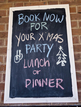 Christmas Lunch Or Dinner Signage Outside A Hotel Cafe.