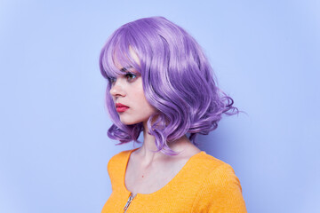 Fashionable girl purple hair holidays blue background