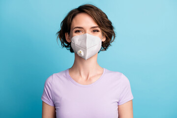 Close-up portrait of her she nice attractive brown-haired girl wearing safety reusable n95 mask flu...