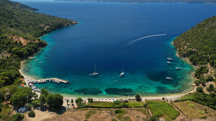 Naklejka premium Aerial drone photo of bay and beach of Polis in Northern part of Ithaki or Ithaca island a safe sail boat anchorage, Ionian, Greece