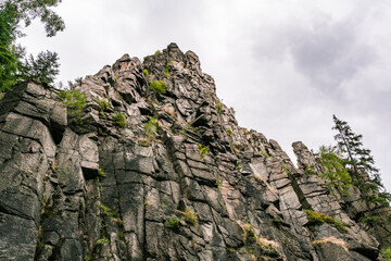 Impressive rock formation in the forest photographed in the Erzgebirge
