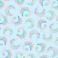 Seamless pattern with cute rainbows