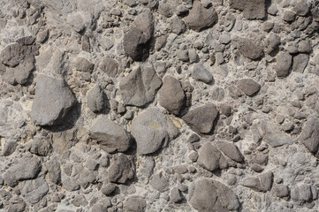 Grey volcanic rocks texture with basalt, geological formation