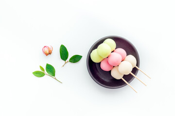 Japanese three colored dumplings Dango on plate, top view