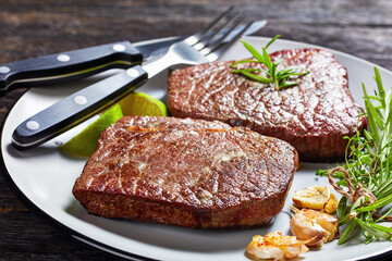 fried rump beef steaks on a plate