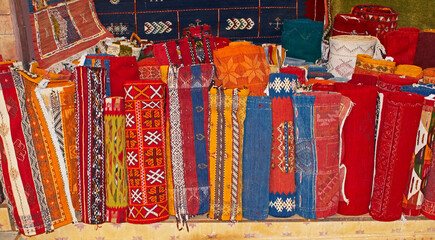 A display of traditioal decorated carpets In the Souk the Street Market at Jemaa el Fnaa